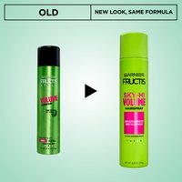 A comparison graphic showing the "OLD" hairspray can (black and green) transitioning with an arrow to the "NEW LOOK" can (all lime green), with text stating "NEW LOOK, SAME FORMULA".