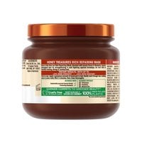 Garnier Whole Blends Honey Treasures Rich Repairing Mask jar back pack shot.