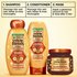 Complete 3-step Garnier Whole Blends Honey Treasures repairing system: featuring repairing shampoo, repairing conditioner, and rich repairing mask for a comprehensive damaged hair care routine.