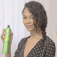 Finish the look by taming loose ends at the front and taming down baby hairs.