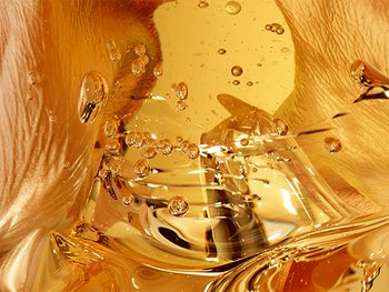 Argan oil being poured.