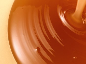 Honey being poured or drizzled.