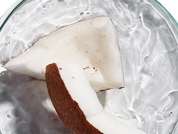 Inside of a coconut with coconut water.