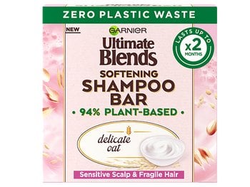 Garnier Ultimate Blends Softening Shampoo Bar with Delicate Oat, featuring zero plastic waste and 94% plant-based ingredients, for sensitive scalp and fragile hair, lasting up to 2 months.