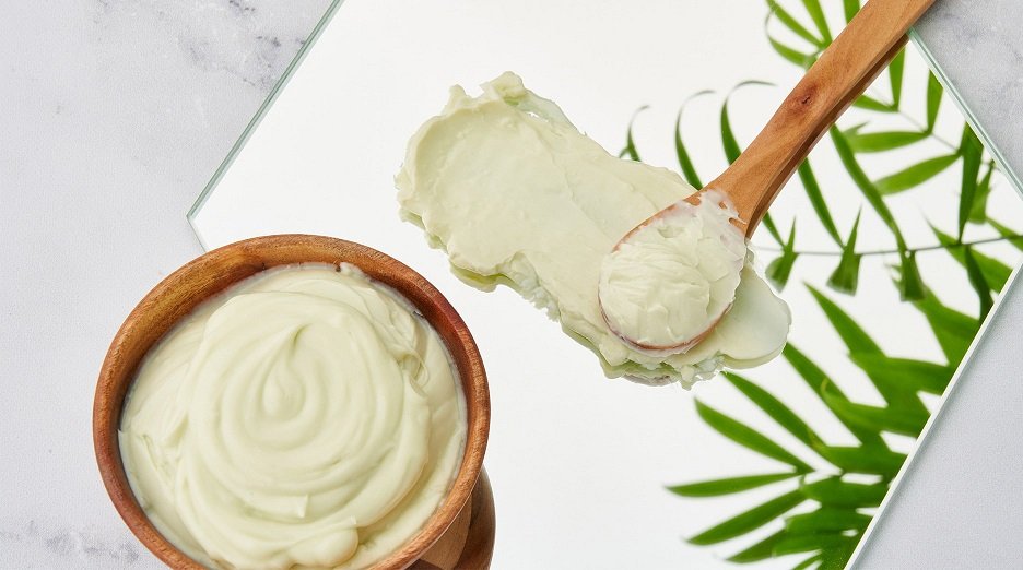 Shea butter and discusses its benefits for hair and skin.
