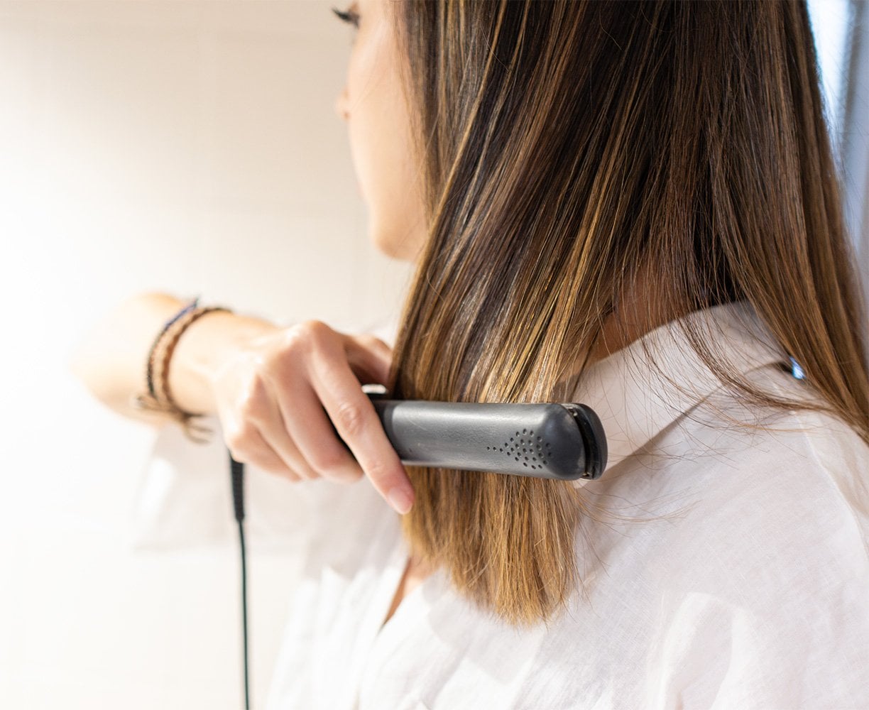 Use a Flat Iron for Sleek Straight Hair