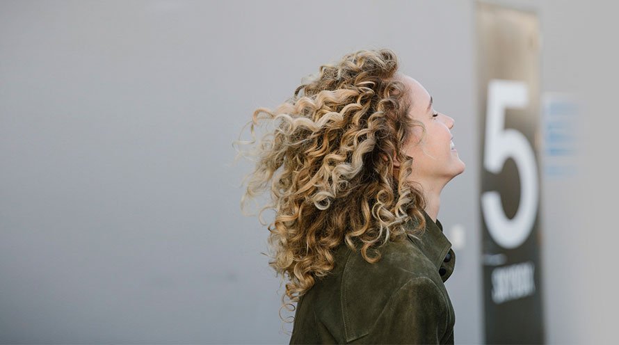30 Stylish Hairstyles for Women with Curly Hair Over 50 in 2024