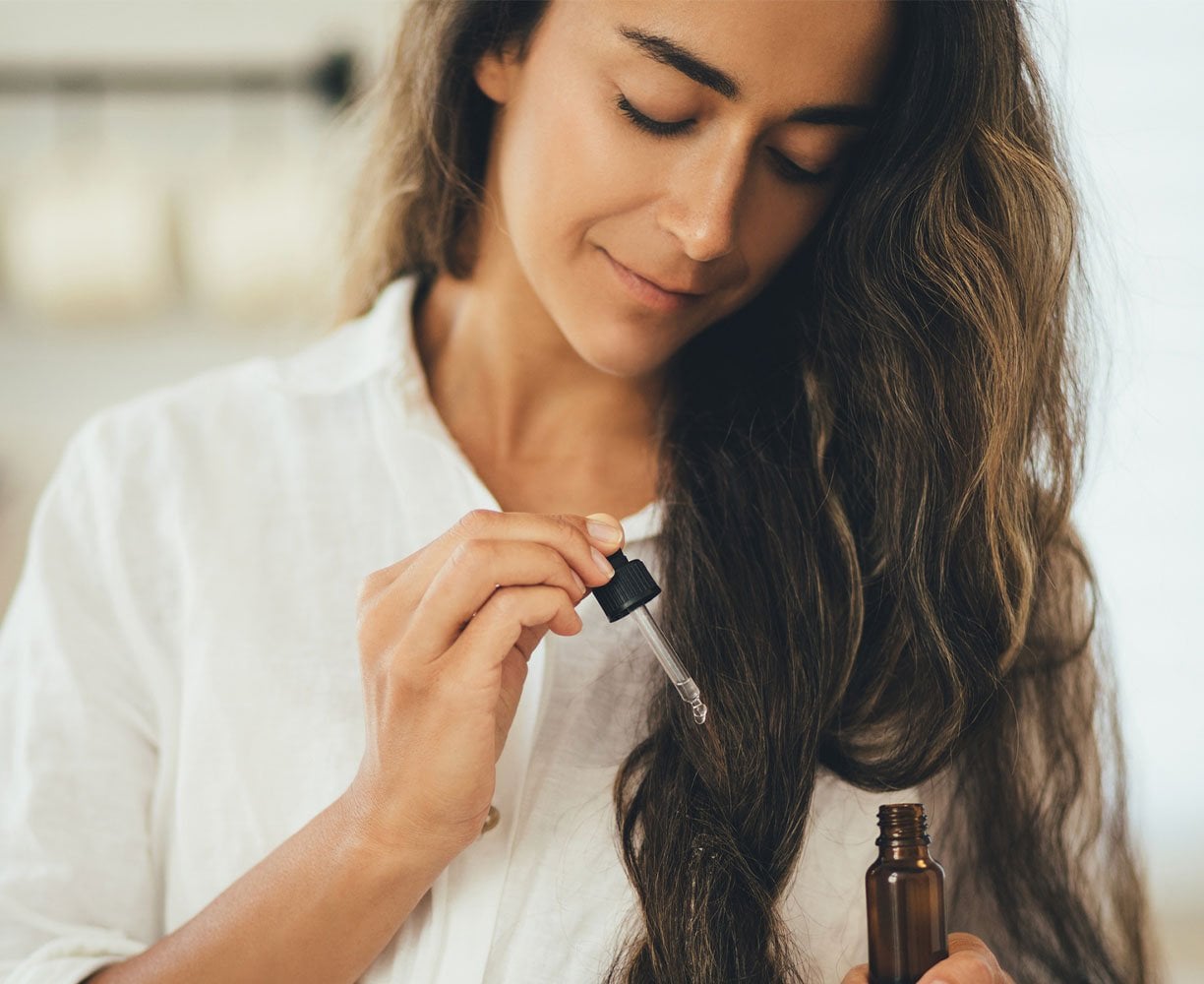 Apply Gloss Spray or Serum Sparingly