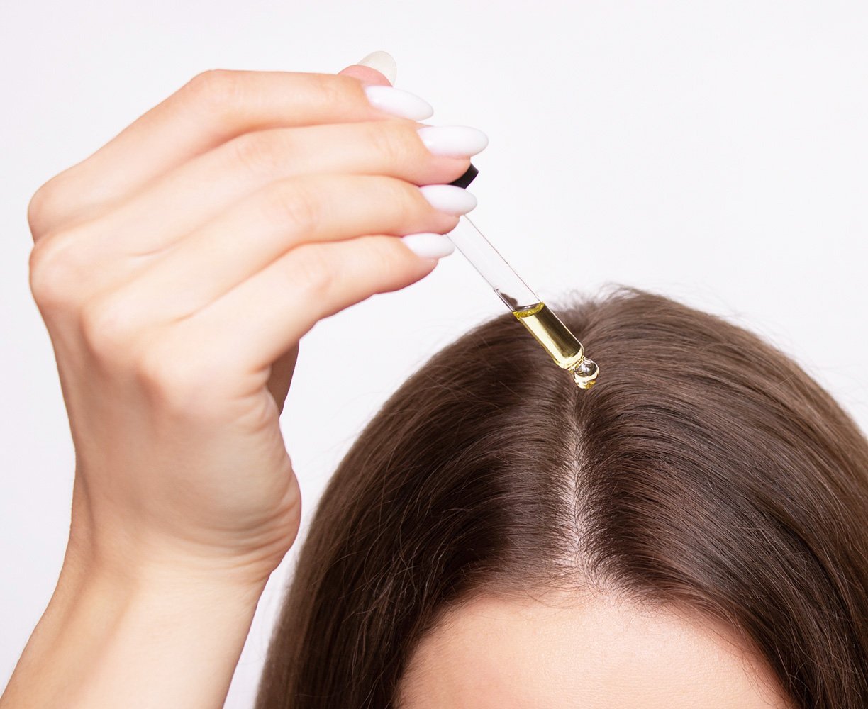Use Anti-Frizz Serum