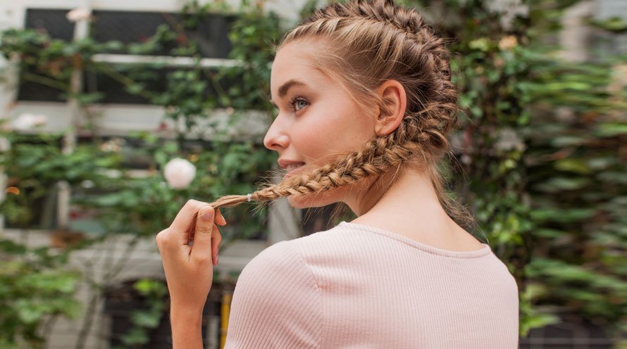 Image of Double twisted ponytails hairstyle for school field trips