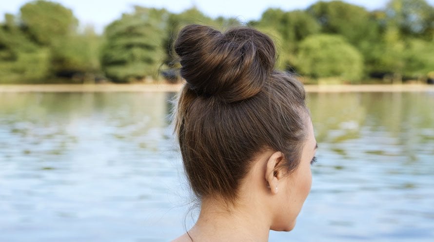 Image of Twisted ballerina bun hairstyle for school curly