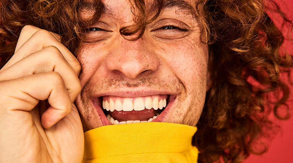Colourful studio portrait of a young man.