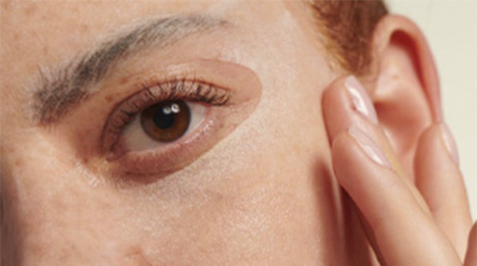 Woman with overnight mask on her face.