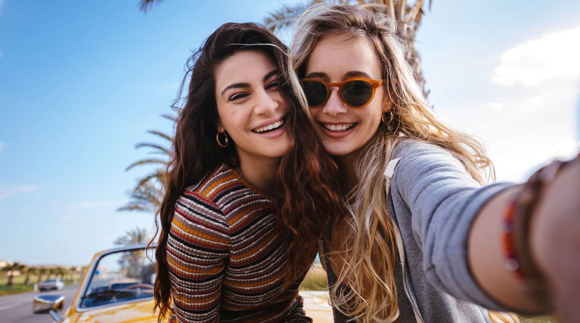 Young Hipster Women On Road Trip Having Fun Taking Selfies High