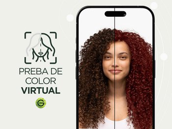 A woman with type 4 curly hair in a natural dark brown shade using Garnier's Virtual Try-On tool to virtually try on an auburn red hair shade.