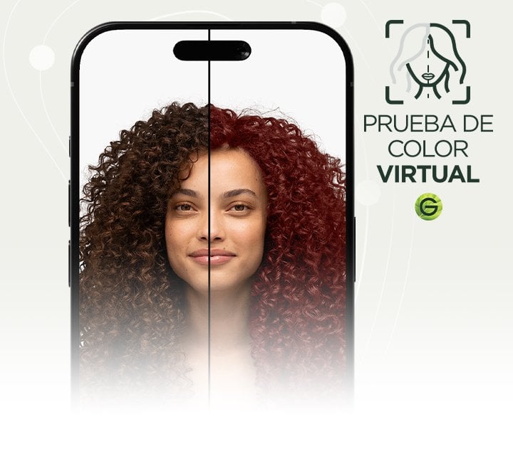 A woman with type 4 curly hair in a natural dark brown shade using Garnier's Virtual Try-On tool to virtually try on an auburn red hair shade.