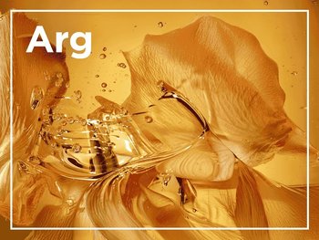 Abstract image of golden, petal-like textures submerged in liquid with bubbles, with the letters "Arg" visible in white.