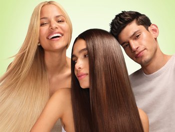 Photo of man and women with sleek and shiny hair after using Sleek & Shine system.