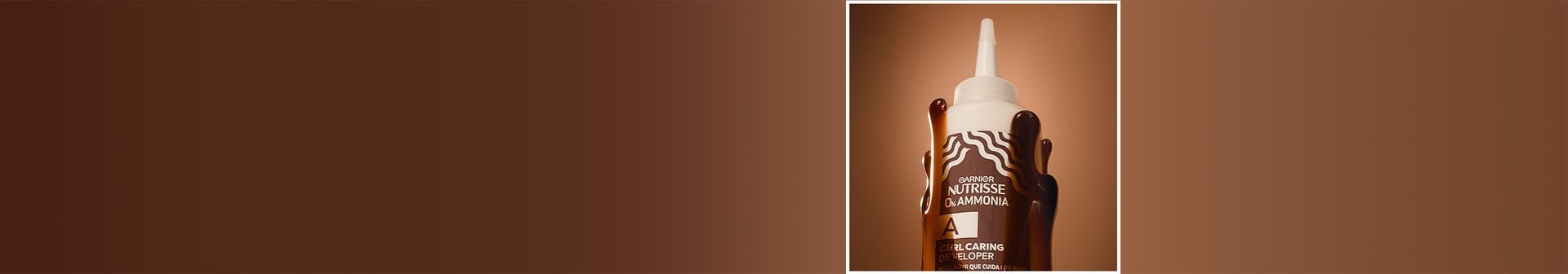 Beauty shot of Glossy Curl Color 0% Ammonia hair dye developer.