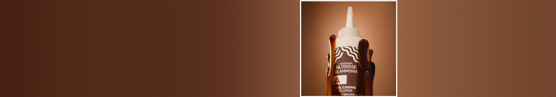 Beauty shot of Glossy Curl Color 0% Ammonia hair dye developer.