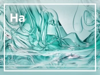 A close-up of a clear, teal-colored gel-like substance with swirling patterns and bubbles, with the letters "Ha" visible in white.