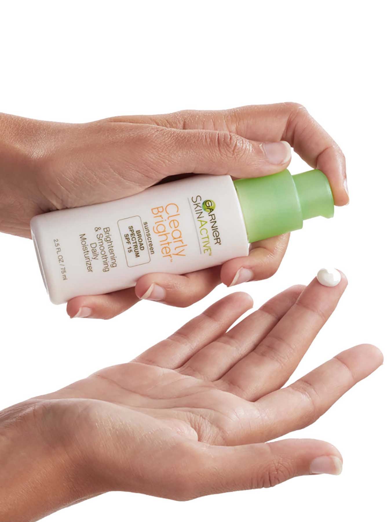 In Use view of Clearly Brighter Broad Spectrum SPF 15 Brightening & Smoothing Daily Moisturizer.
