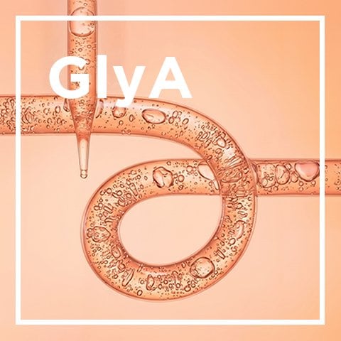 Texture of gel cream liquid Glycolic Acid gel on orange background