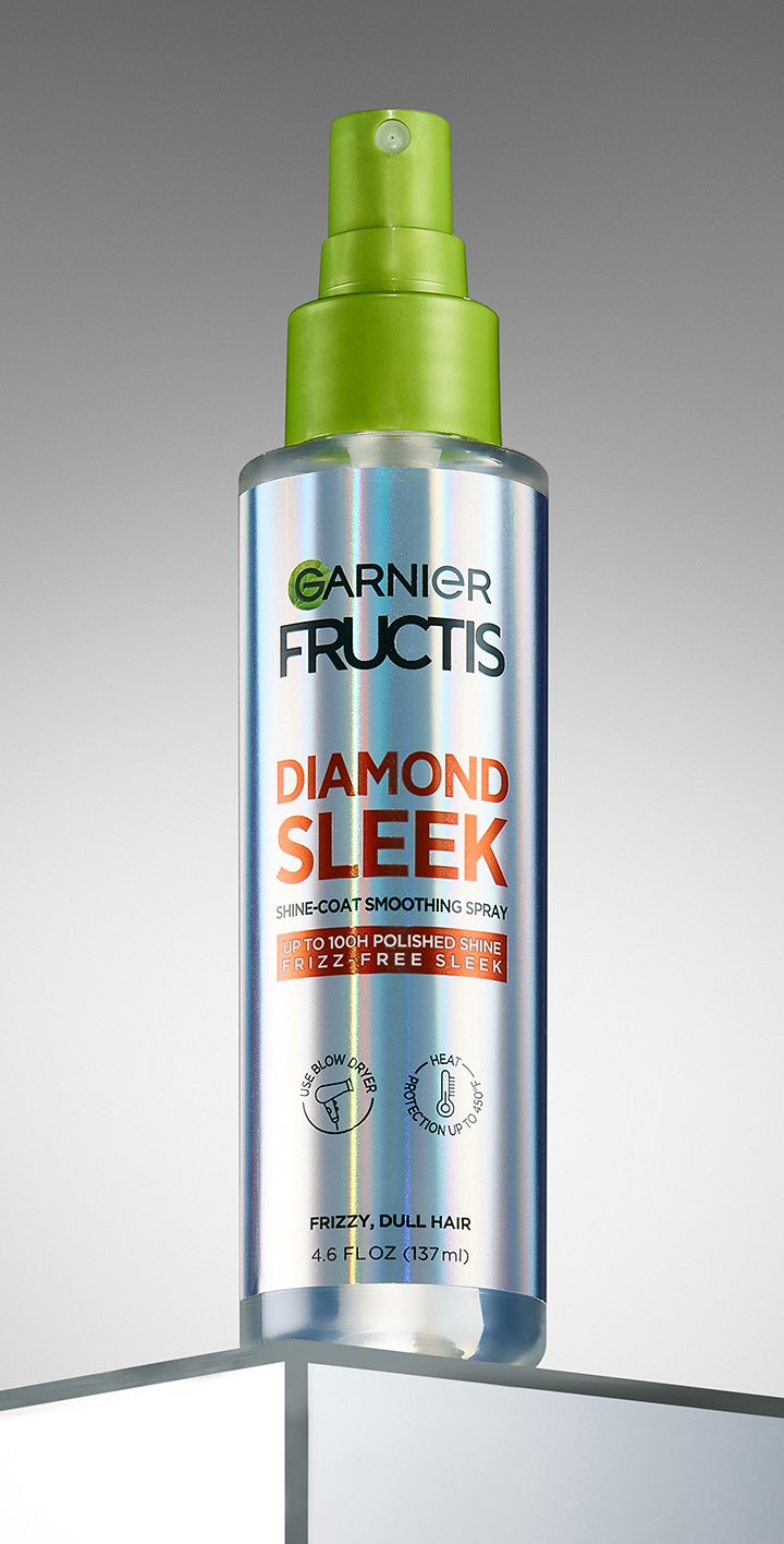 Garnier Fructis Diamond Sleek Shine-Coat Smoothing Spray 4.6 fl oz: hair heat protectant spray for frizzy, dull hair providing up to 100H polished shine and 450°F heat protection.