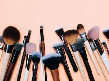 Makeup brushes on a flat surface