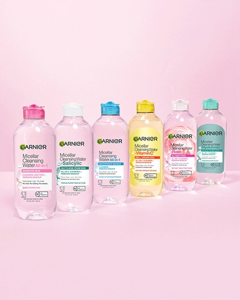 Pink background and multiple Garnier Micellar Water products displayed in a row.
