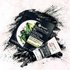 Garnier SkinActive Super Purifying Charcoal Sheet Mask and SkinActive Clean+ Blackhead Eliminating Scrub on an explosion of charcoal powder on pinkish white marble.