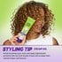 Styling tip: woman holding Curl Sculp Conditioning Cream Gel.