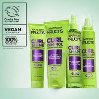 Garnier Fructis curly hair product line: including Curl Shine Conditioning Jelly, Curl Control Scrunching Gel, Curl Shape Defining Spray Gel, and Curl Construct Creation Mousse, featuring vegan formulas and 100% recycled plastic caps.