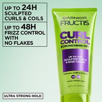 Garnier Fructis Curl Control Scrunching Gel packaging update: transitioning from the old Curl Scrunch Controlling Gel look to the new lime green tube design.