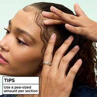 Hair styling tip for baby hairs and edges: use a pea-sized amount of Garnier Fructis Curl Control Scrunching Gel per section for precise edge taming.