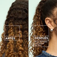 Before and after comparison: frizzy, undefined hair transformed into sculpted curls with frizz control using Garnier Fructis Curl Control Scrunching Gel.