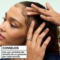 Hair styling tip for baby hairs and edges: use a pea-sized amount of Garnier Fructis Curl Control Scrunching Gel per section for precise edge taming.
