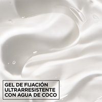 Macro texture shot of clear, smooth Garnier Fructis Curl Control Scrunching Gel with ultra-strong hold and hydrating coconut water.