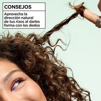 Hair styling tip: use your curls' natural direction when defining with fingers using Garnier Fructis Curl Shine Conditioning Jelly for best results.