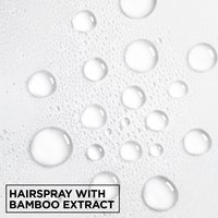 A macro shot of clear water droplets on a white surface. Text at the bottom reads "HAIRSPRAY WITH BAMBOO EXTRACT".