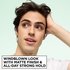 A young man with dark, effortlessly styled hair. Text below reads "WINDBLOWN LOOK WITH MATTE FINISH & ALL-DAY STRONG HOLD".