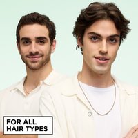 Two men with different hair textures—one with dark curls and one with wavy hair—posing together. Text at the bottom reads "FOR ALL HAIR TYPES".