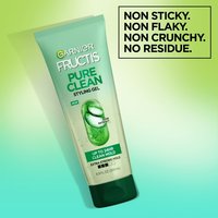 Front packaging of the Garnier Fructis Pure Clean Styling Gel. This product formula is non sticky, non flaky, non crunchy, and has no residue.