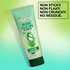Front packaging of the Garnier Fructis Pure Clean Styling Gel. This product formula is non sticky, non flaky, non crunchy, and has no residue.
