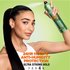A model using Garnier Fructis Sleek & Shine hairspray, emphasizing its 24-hour hold and anti-humidity protection.