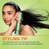 A model demonstrates the use of Garnier Fructis Sleek & Shine hairspray. A styling tip advises using frizz tamer for a slicked-back look.