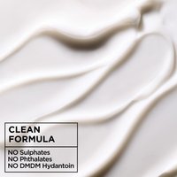 A close-up of white cream texture, with text proclaiming "CLEAN FORMULA" and listing what it's formulated without: "NO Sulphates, NO Phthalates, NO DMDM Hydantoin."