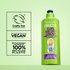 Garnier Fructis Curl Air Dry Cream bottle alongside a panel detailing "Cruelty Free International" certification, "99% Vegan" ingredients, and "100% Recycled Plastic" bottle.