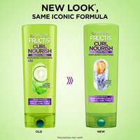 Garnier Fructis Curl Nourish conditioner packaging update: showing the transition from the old bottle design to the new look with the same iconic moisturizing formula.