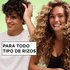 Inclusive hair care for all curl types: man and woman with diverse curly textures showcasing healthy, bouncy hair achieved with the Garnier Fructis styling line.